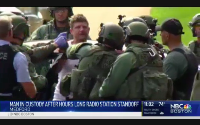 Ax-Wielding Man in Standoff With Police Over Radio Request Ax-Wielding Man in Standoff With Police Over Radio Request